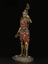 Shiva brass idol holding trident, one hand raised, red-and-green ornate outfit, 12 in