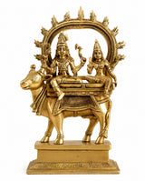 Brass Shiv-Parvati statue on Nandi, two seated figures with raised hands and halo arch