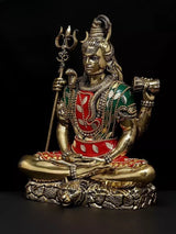 Brass Lord Shiva four-armed figure with trident and drum, ornate red robe