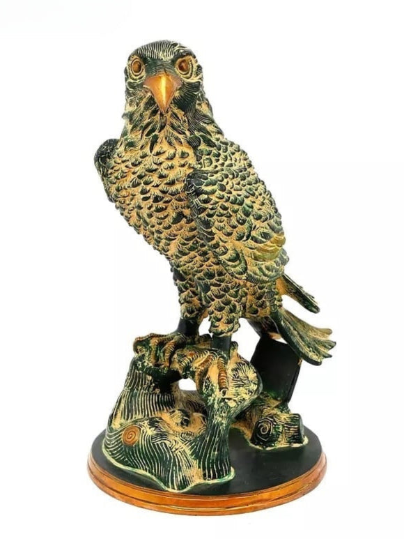 Brass eagle figurine on black base, detailed feathers, orange beak, 15 in tall