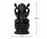 Front view dark wood Ganesha statue on lotus base, 10 cm tall, 5 cm wide