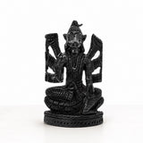 Black seated Varahi Amman figurine, detailed ridged texture, hands raised