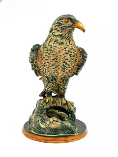 AONA brass eagle figurine back view, textured feathers and orange beak on base