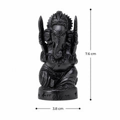Black Ganesha idol sculpture, front view; 7.6 cm tall and 3.8 cm wide