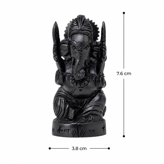 Black Ganesha idol sculpture, front view; 7.6 cm tall and 3.8 cm wide
