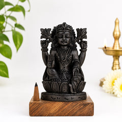 Lakshmi Ji statue with lotus pedestal, dark textured finish, hand-raised figure