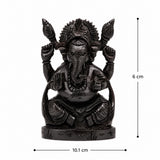 Lord Ganesha bust statue, black finish, raised arms, detailed jewelry, seated on round base