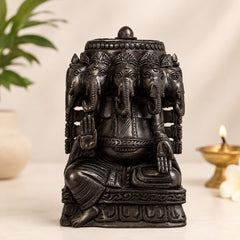 Panchamukhi Ganesh idol in dark carved wood, five elephant-headed faces, seated pose