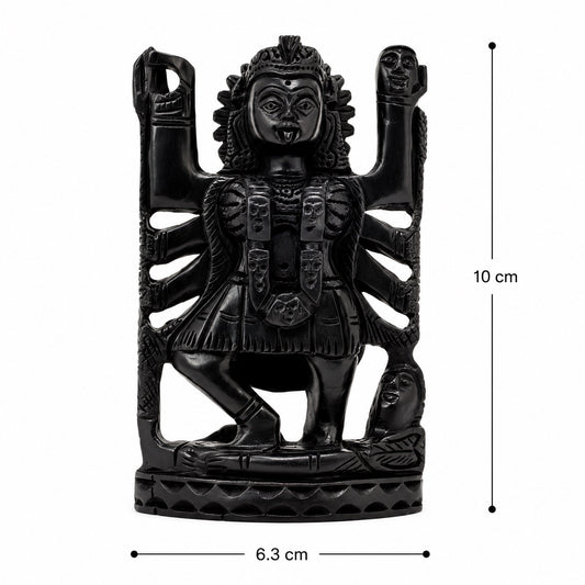 Dark carved deity idol figurine, 10 cm tall and 6.3 cm wide