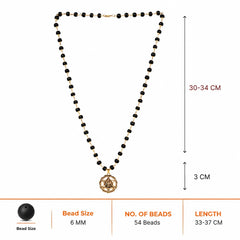 Black bead necklace with round silver Yantra pendant, hanging at the center