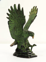 Brass Eagle statue, side view with raised head and wings, green bronze finish