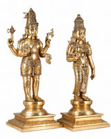 Brass Shiva and Parvati deity statues, angled views with ornate detailing on pedestals