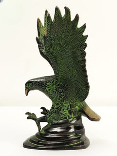 Brass Eagle statue close rear view, wings fanned, green patina, decorative base