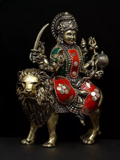 Brass Sherawali Durga statue on lion, trident and drum-like object, ornate crown