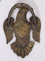 Brass eagle door knocker with ring handle and antiqued wings