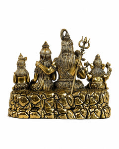 Golden brass Shiva Parivar statue, side view showing Shiva with trident and seated attendants