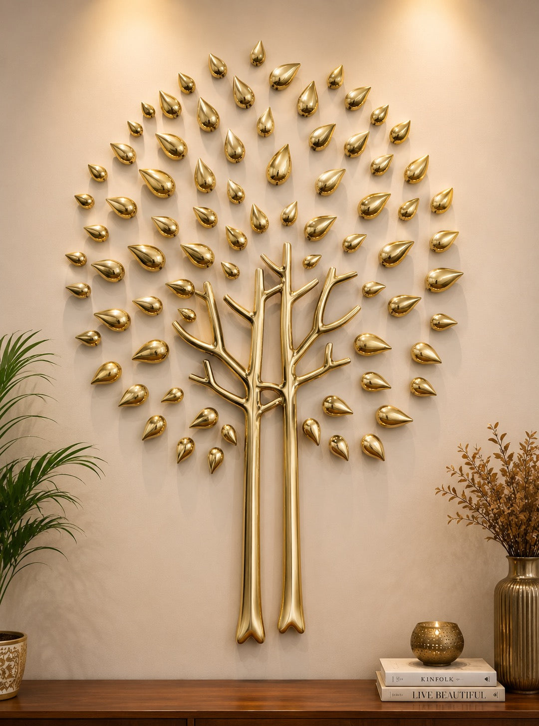 Brass tree wall sculpture with gold dew-drop ornaments, detailed branches and twin trunks.