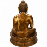 Brass Buddha idol, seated back view, textured hair, bronze-gold patina finish
