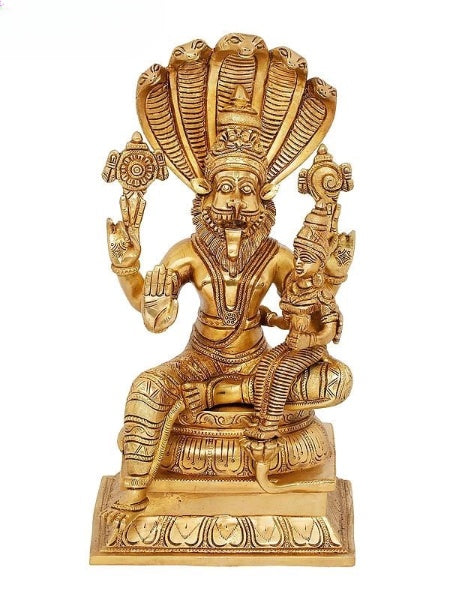 Brass Narasimha statue with consort Bhudevi, seated on ornate pedestal