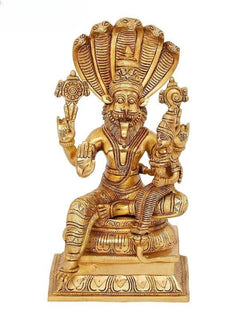 Brass Narasimha statue with consort Bhudevi, seated on ornate pedestal