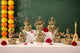 Brass Lakshmi idol set of 8, seated goddesses with ornate crowns