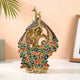 Brass peacock figurine with colorful jewel inlay and arched base