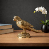 AONA brass parrot statue with intricate carved feathers, raised on ornate round base