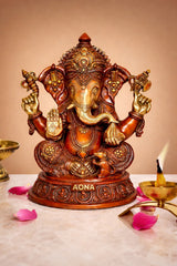 Multicolour Ganesha brass statue, seated with raised hands and ornate jewelry base