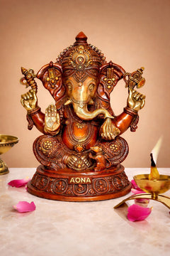 Multicolour Ganesha brass statue, seated with raised hands and ornate jewelry base