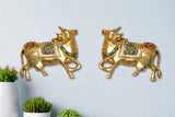 Brass cow pair wall hanging statues with jeweled saddle details