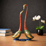 Set of 2 kissing swan statues: red necks, green mosaic bodies, blue bases