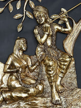Brass Radha and Krishna detail, Krishna holding a flute beside the tree branches