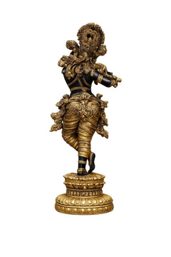 Brass Lord Krishna idol in tribhangi pose, side view holding a flute; ornate circular base