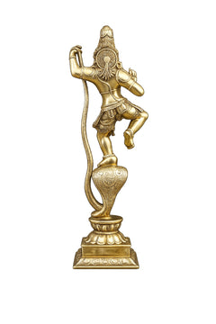 Krishna statue side view, golden brass finish, holding a curved staff, detailed jewelry