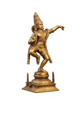 Dancing Krishna statue in antique copper brass, one arm extended, arched stance