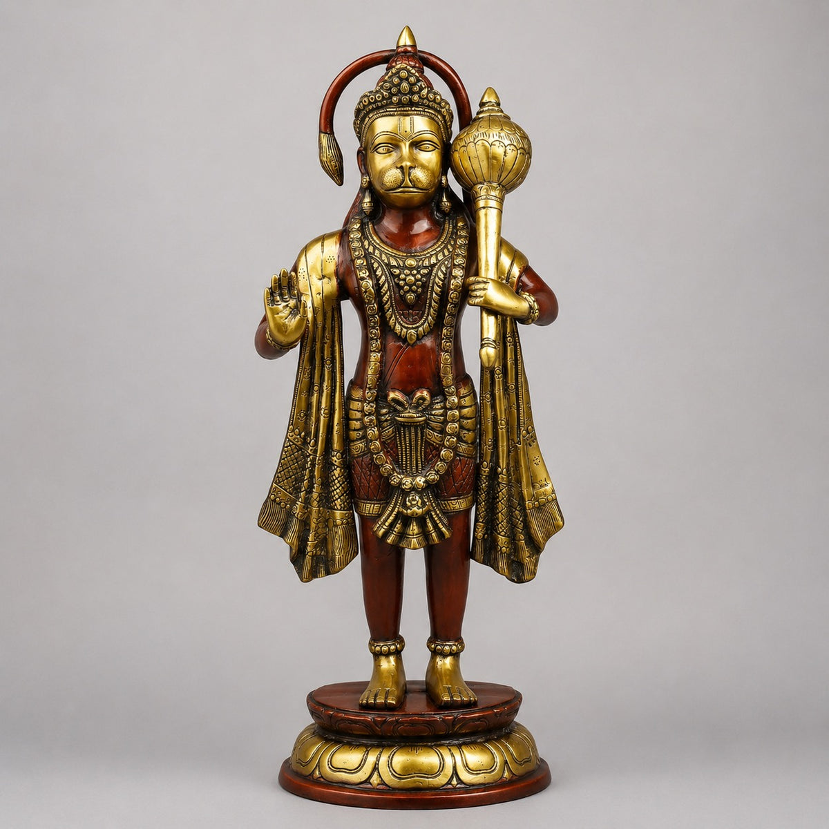 Standing Hanuman statue with rich copper and gold-tone finish, raised hands and ornaments
