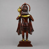 Back view of standing Hanuman statue in copper-brown with gold accents and raised finial