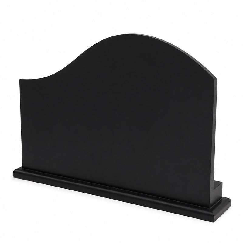 Black arched back of brass chariot showpiece on black base