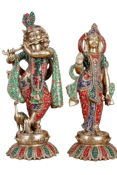Brass Radha-Krishna sculpture with meenakari dress, colorful pair on round base