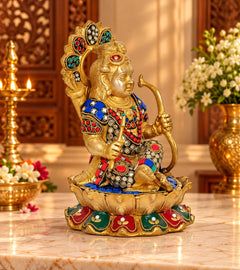 Brass Ram Lalla sitting idol, side view with gold hand, jeweled crown, lotus base