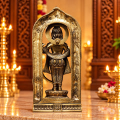 Brass deity statue rear view inside arched frame with circular emblem and base