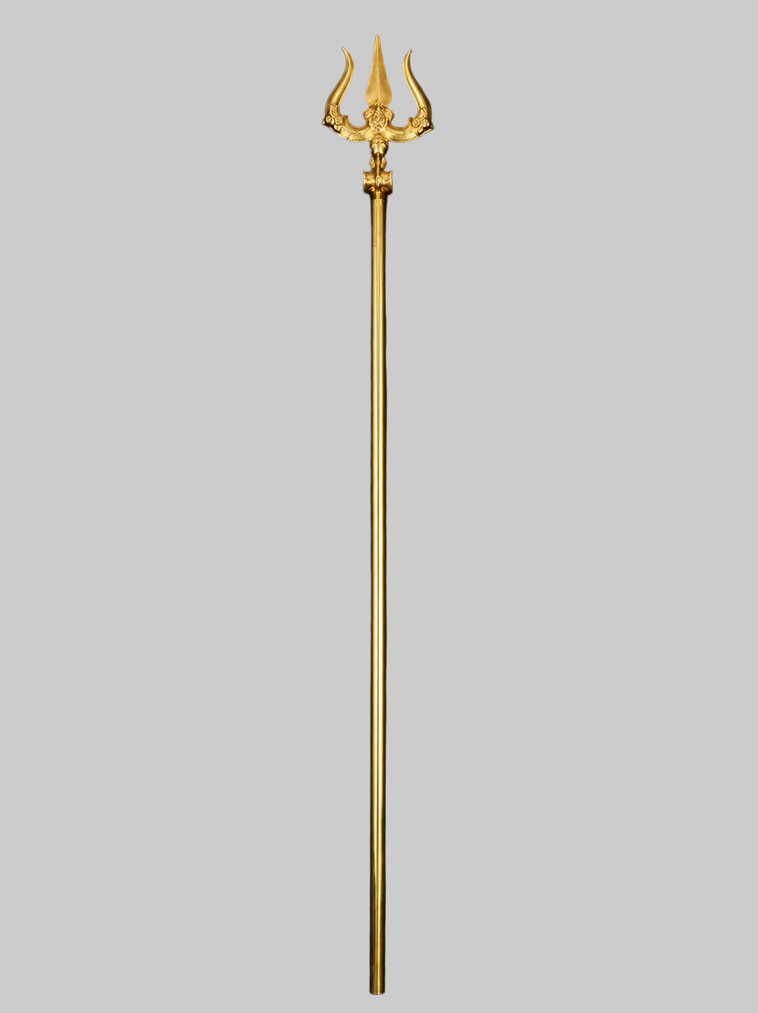 Brass trishul with three-tined top and long straight shaft