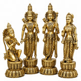 Four-piece golden brass deity statue set with detailed faces and round carved bases