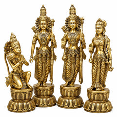 Four-piece golden brass deity statue set with detailed faces and round carved bases