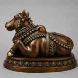 Brass brown bull vahana statue with engraved decorative paneling and raised head