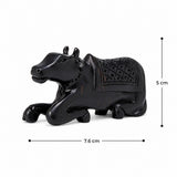 Dark Nandi bull figurine, side profile, detailed saddle with diamond texture