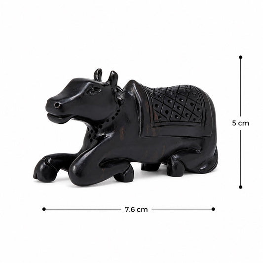 Dark Nandi bull figurine, side profile, detailed saddle with diamond texture