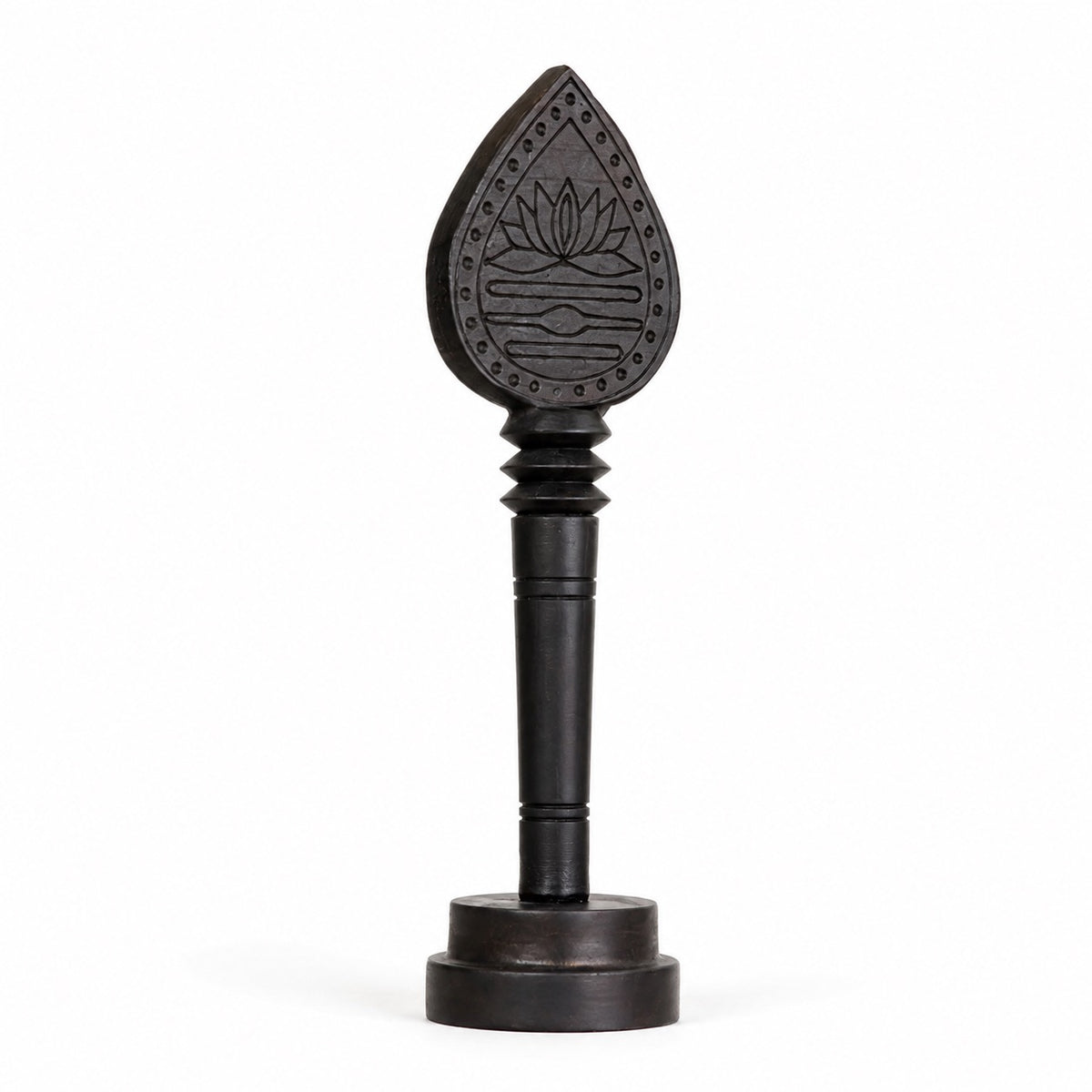 Dark wooden vel with engraved lotus teardrop head and round display base