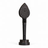 Dark wooden vel with engraved lotus teardrop head and round display base