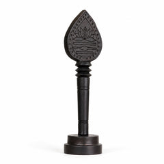 Dark wooden vel with engraved lotus teardrop head and round display base